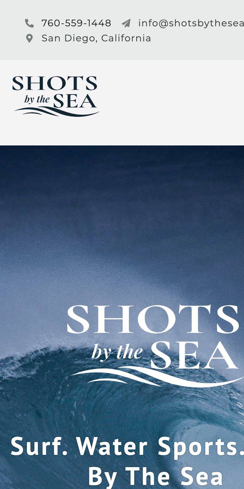 Shots by the Sea homepage on a phone